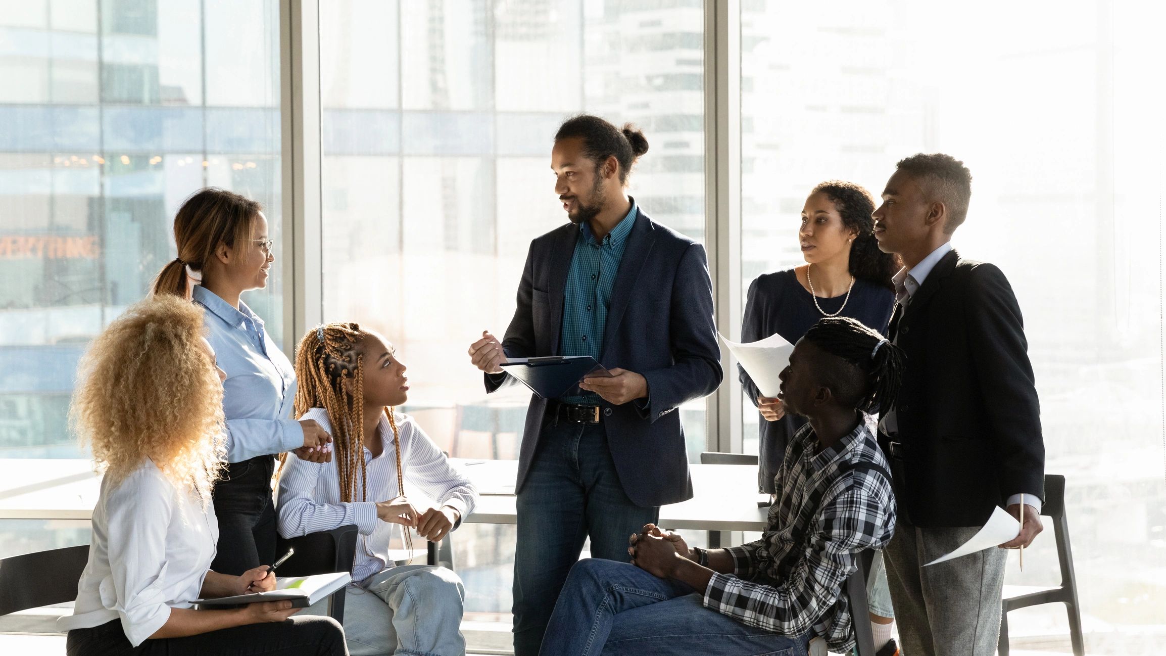 Group brainstorming together at a table